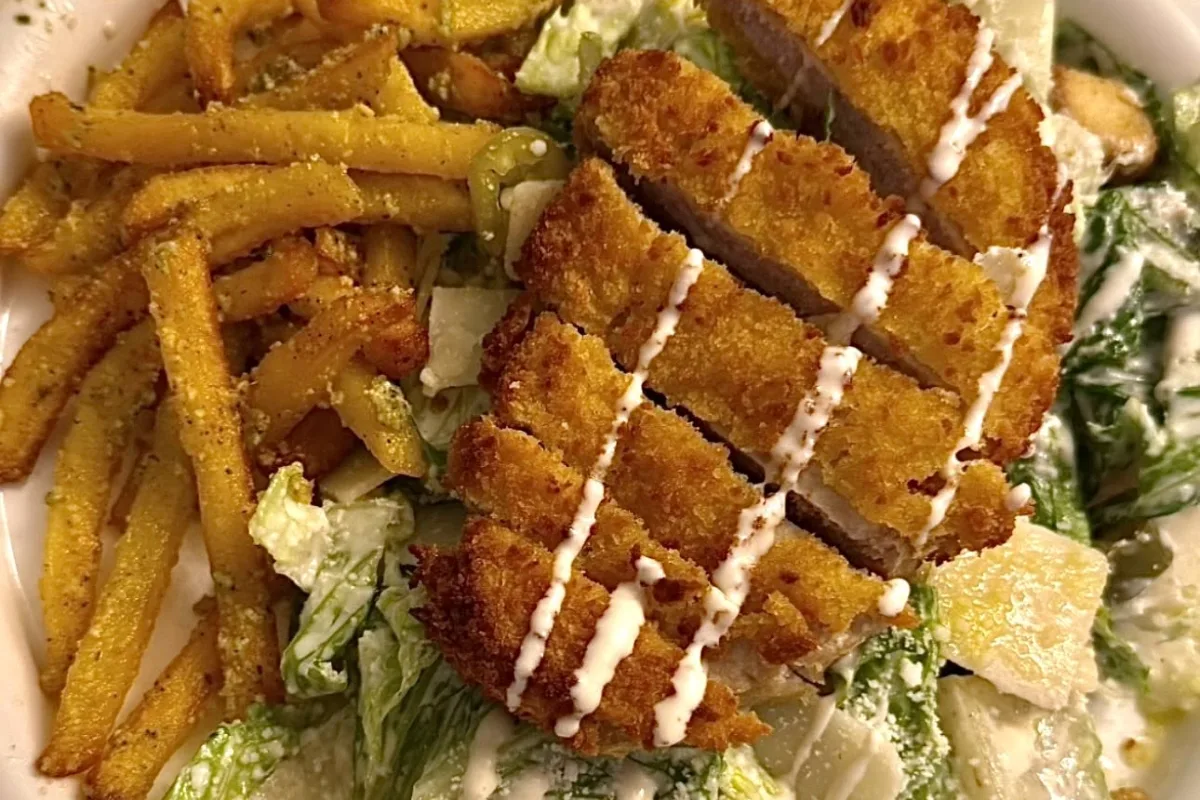 salad with french fries on top