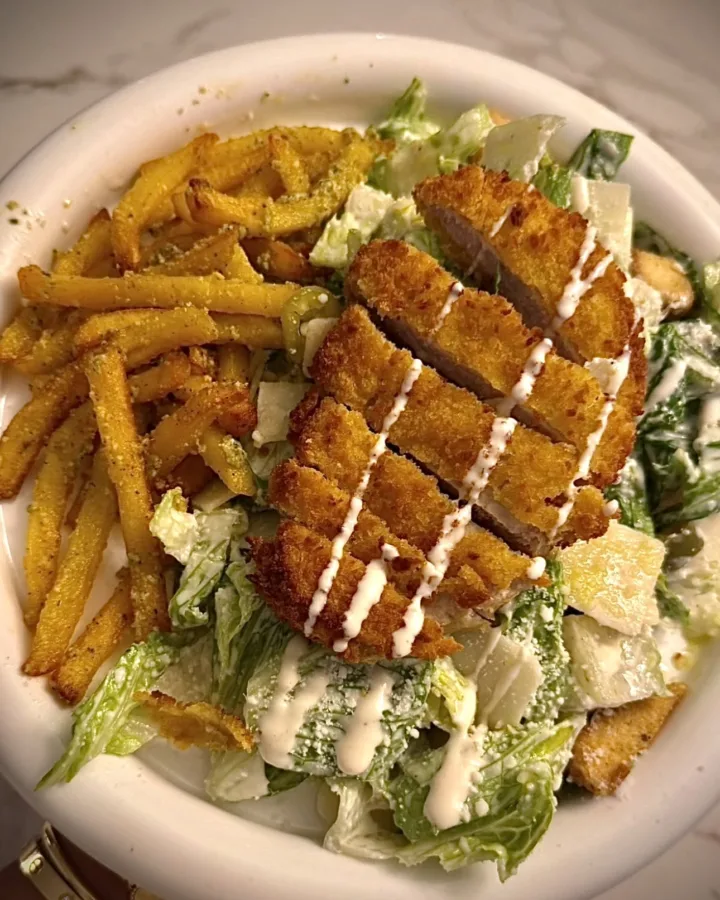 salad with french fries on top