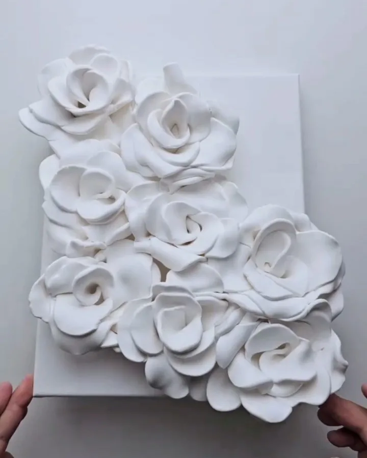 clay rose flowers on canvas